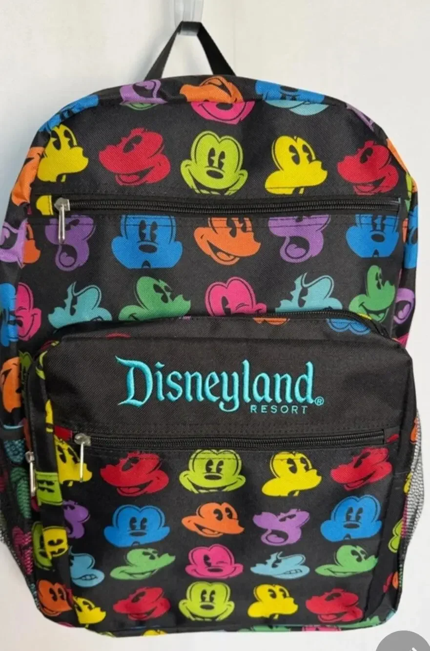 Disneyland Resort backpack featuring a rainbow Mickey Mouse pattern.